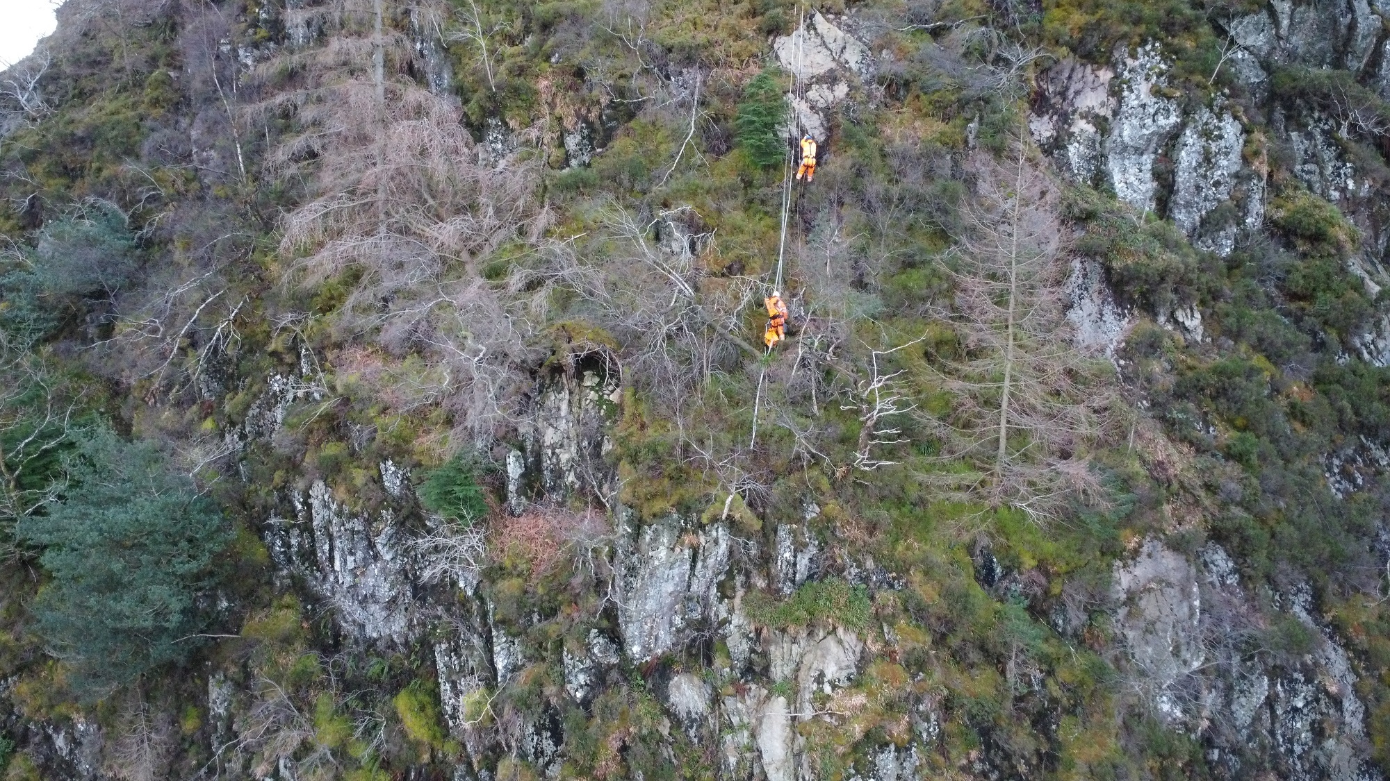 Assessing the rock face on Rough Crag