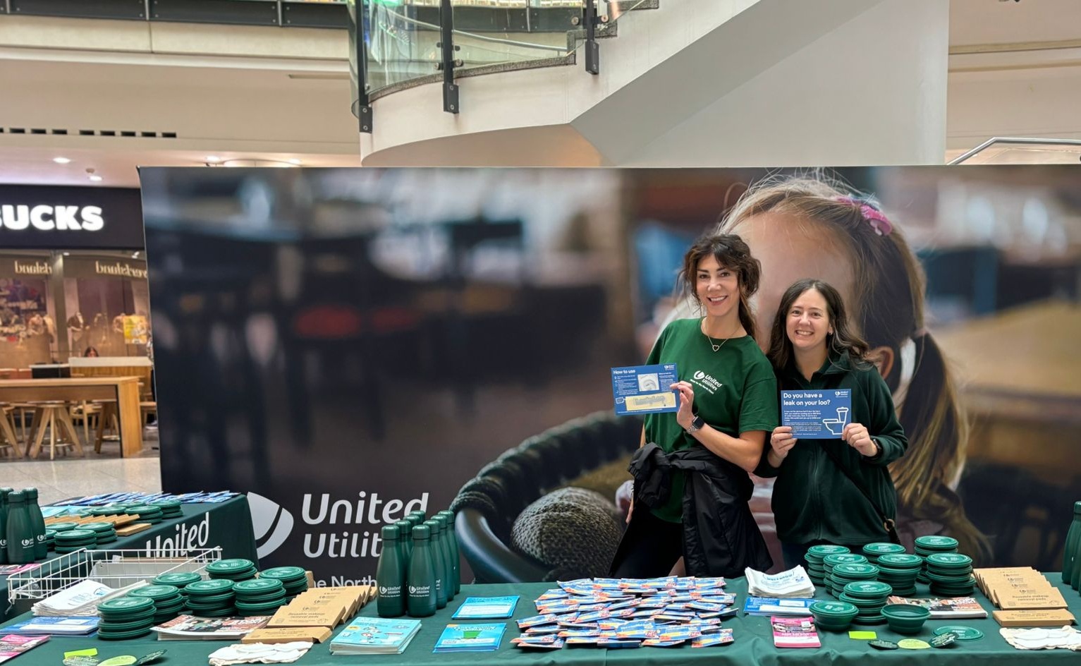 United Utilities employees at a fair stand