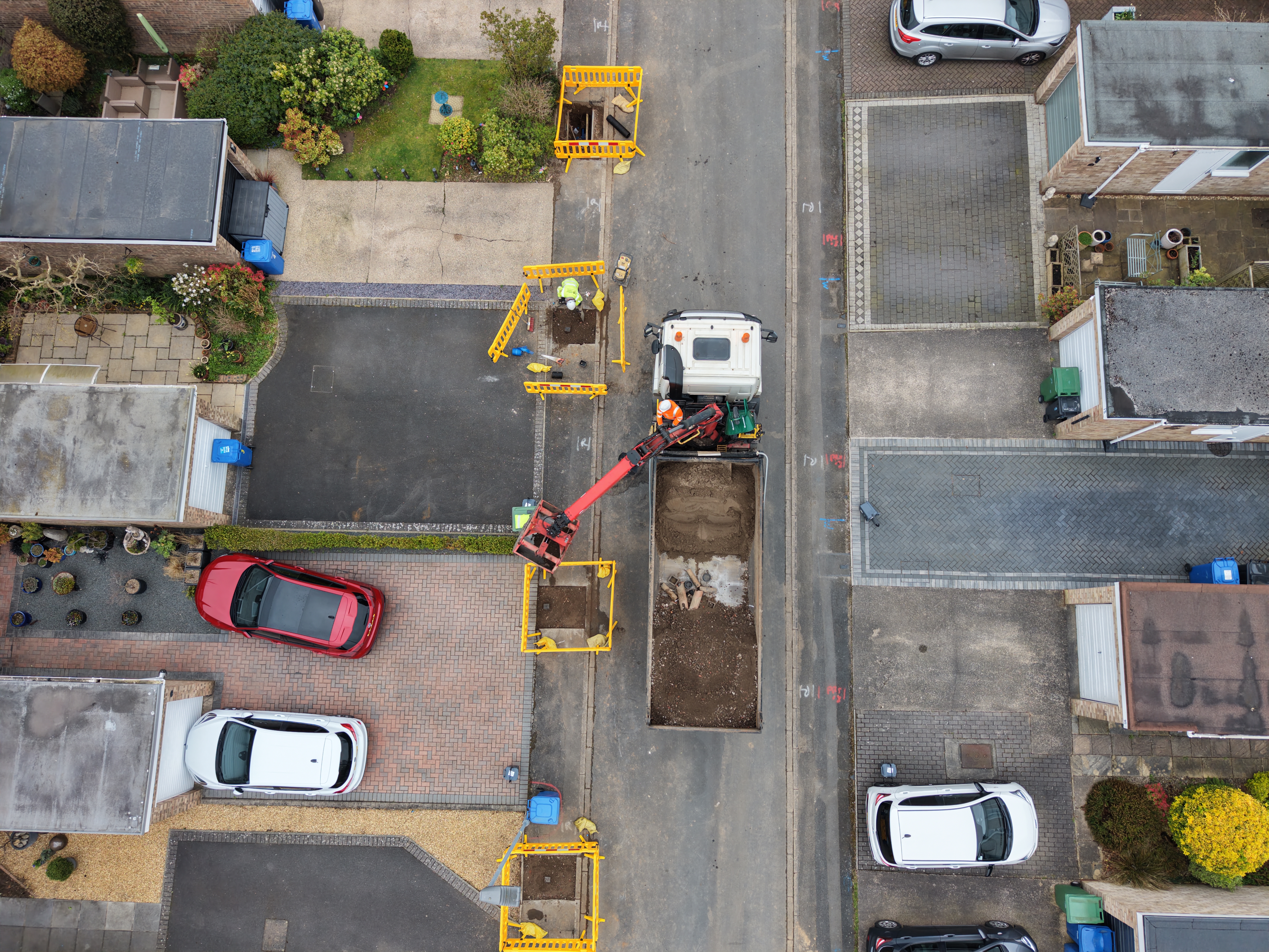 Birds-eye overhead view of road digging